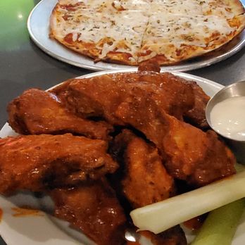 Avenue Pub - Plate of wings (buffalo sauce) and bar pie (plain) - Burgers Near Me - Maplewood, New Jersey