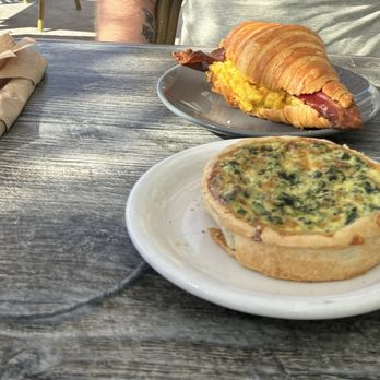 Sweet Elena's Bakery & Cafe - Bacon and egg croissant (back) and spinach/Swiss quiche - Bakeries Near Me - Seaside, California