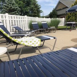 Stonebridge Creek Rec Center - Plenty of outdoor seating for relaxation and tanning.
