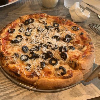 Mamma Mia - Personal size pizza with olives & mushrooms. Homemade thin crust and homemade sauce. Pretty good! - Italian Near Me - Riverside, California Mamma Mia - Personal size pizza with olives & mushrooms. Homemade thin crust and homemade sauce. Pretty good! - Italian Near Me - Riverside, California