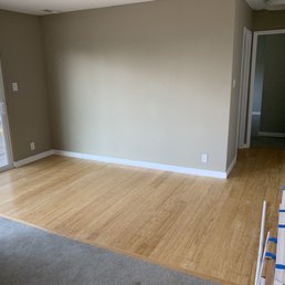 New baseboards and bamboo flooring. Amos also painted many of the walls.