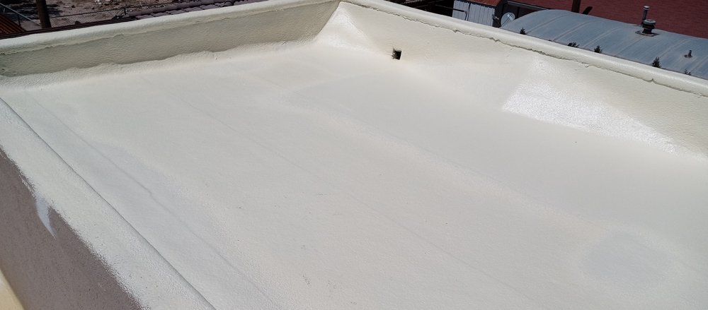 Slide of Mann & Sons Roofing