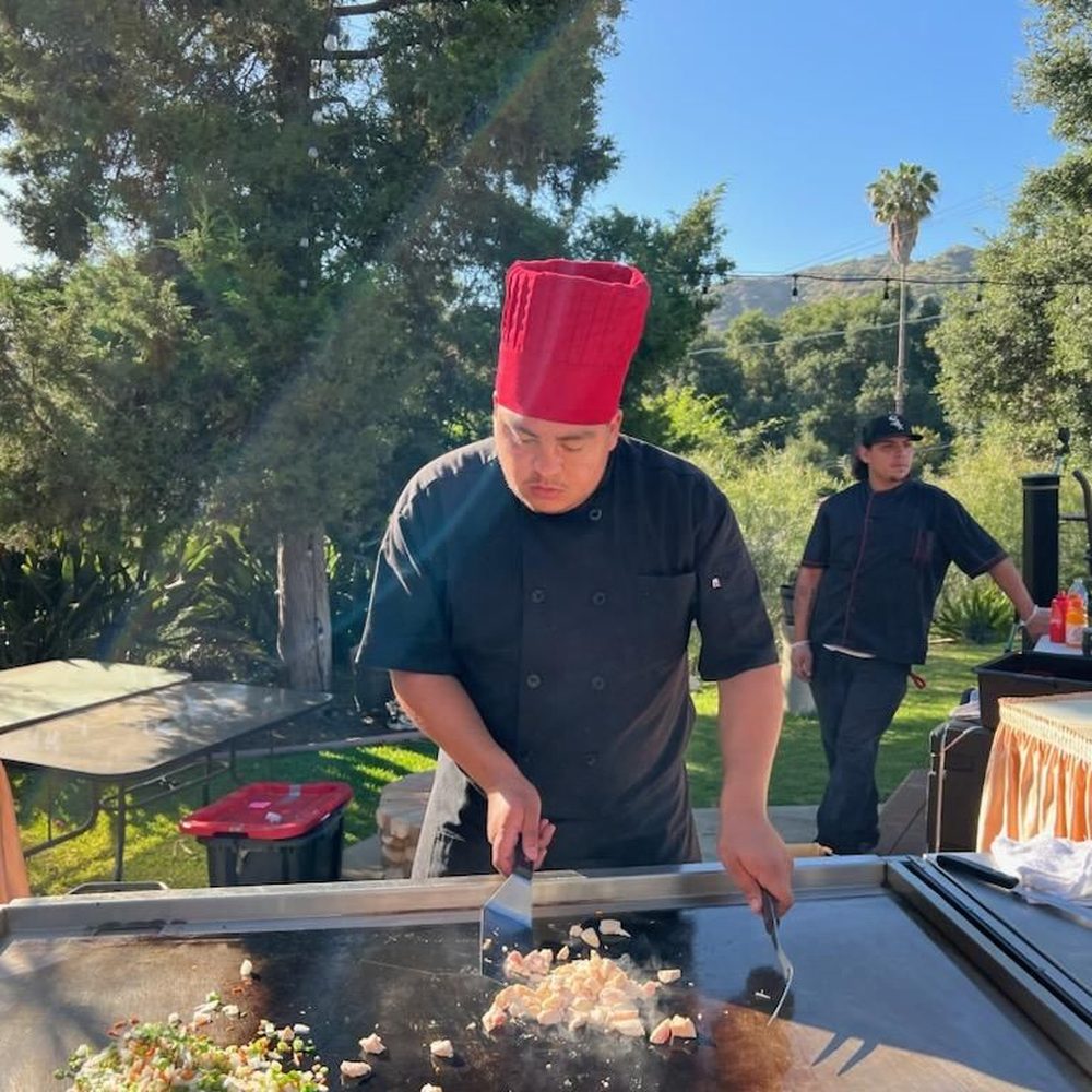 Teppan Catering Arigato - Cooking veggies for fried rice - Caterers Near Me Teppan Catering Arigato - Cooking veggies for fried rice - Caterers Near Me