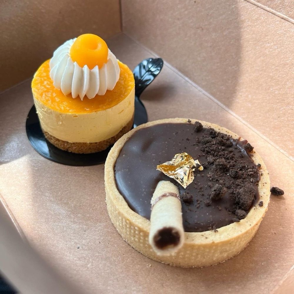 Tiki Java Jax - Chocolate tart and mango cheesecake - Coffee & Tea Near Me - Jacksonville, Florida Tiki Java Jax - Chocolate tart and mango cheesecake - Coffee & Tea Near Me - Jacksonville, Florida