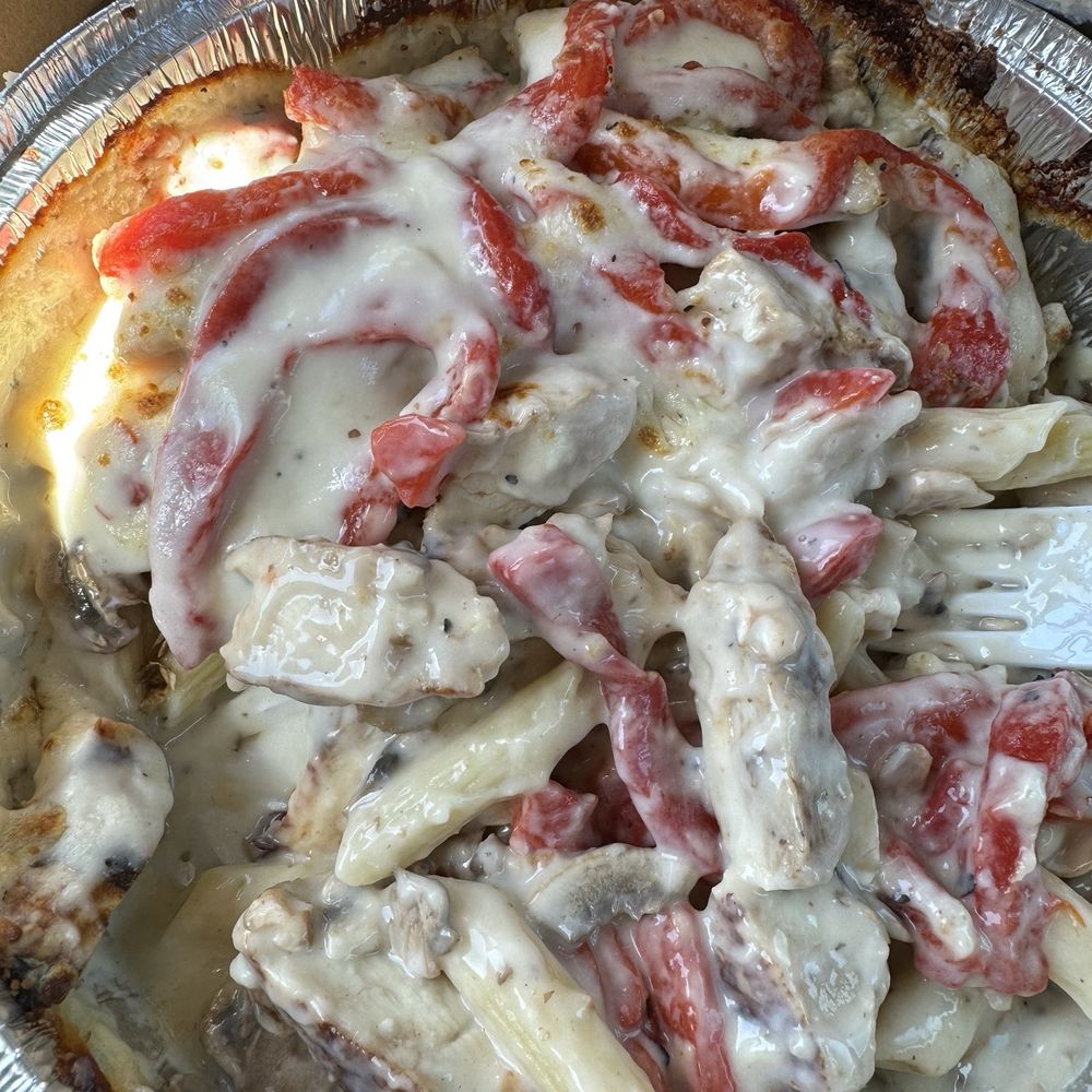Chicken Alfredo with red peppers added. Chicken Alfredo with red peppers added.
