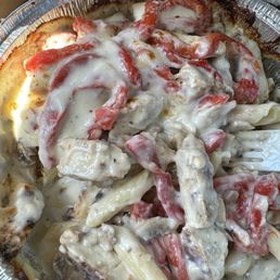 Chicken Alfredo with red peppers added.