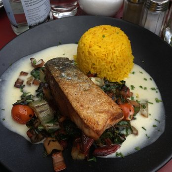 Metzgerei Schmitz - Salmon with Saffron Rice and Chard - Cafes Near Me - Cologne, NW