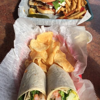 Squid Lips - Pineapple teriyaki Mahi sandwich and grilled shrimp Ceasar wrap - Seafood Near Me - Sebastian, Florida Squid Lips - Pineapple teriyaki Mahi sandwich and grilled shrimp Ceasar wrap - Seafood Near Me - Sebastian, Florida