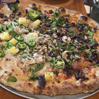 American Flatbread - Vegan Pizza half with added jalapeño slices, pineapple, and vegan cheese - Pizza Near Me - Rockport, Maine