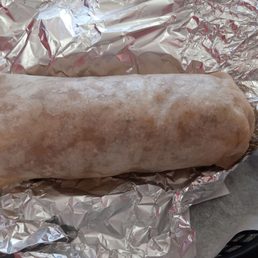 Lengua burrito is filled with rice and a lot of meat but very little beans. Not the best tasting anyway.
