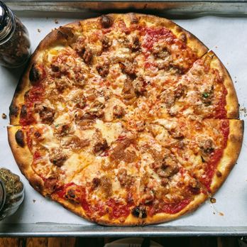 Piece Brewery and Pizzeria - Hot Doug's Atomic Pizza.. Red pizza with pepper jack cheese, caramelized onions and Atomic sausage. - Pizza Near Me - Chicago, Illinois Piece Brewery and Pizzeria - Hot Doug's Atomic Pizza.. Red pizza with pepper jack cheese, caramelized onions and Atomic sausage. - Pizza Near Me - Chicago, Illinois