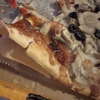 Ledo Pizza - Again weird crust bubbles that split the crust and make the pizza unbearable and flavorless. - Pizza Near Me - Manassas, Virginia