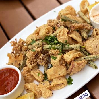 Fuzio Universal Bistro - a plate of fried food - New American Near Me - Modesto, California Fuzio Universal Bistro - a plate of fried food - New American Near Me - Modesto, California