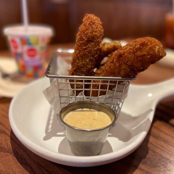 Carnation Cafe - Fried pickles with house sauce. Four pickle spears included in order. - American Near Me - Anaheim, California Carnation Cafe - Fried pickles with house sauce. Four pickle spears included in order. - American Near Me - Anaheim, California