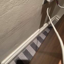 Swan Hotel - Dirt behind the shelf