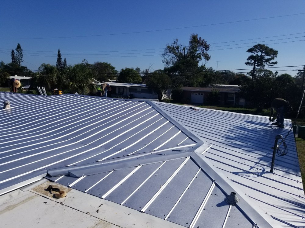 Slide of DG Roofing & Construction