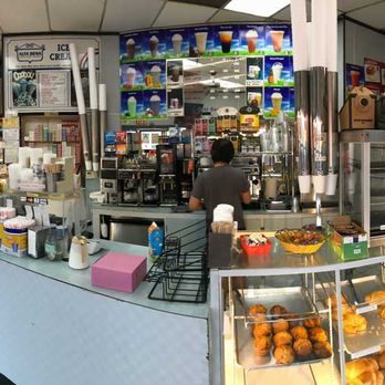 Perfect Donuts - The menus cover the walls behind the donut cases. - Donuts Near Me - North Hollywood, California Perfect Donuts - The menus cover the walls behind the donut cases. - Donuts Near Me - North Hollywood, California