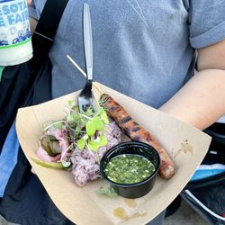 International Bazaar - Union Hmong Kitchen - Hmong Sausage, purple sticky rice, tiger sauce