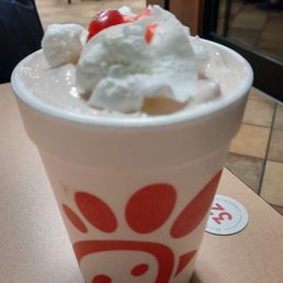 ows a cup of ice cream with a cherry on top ows a cup of ice cream with a cherry on top
