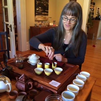 Tealeaves Tea Tasting Bar - Karen Hartwick pouring our Magnolia Oolong tea in a Taiwanese tea ceremony style. - Tea Rooms Near Me - Stratford, Ontario Tealeaves Tea Tasting Bar - Karen Hartwick pouring our Magnolia Oolong tea in a Taiwanese tea ceremony style. - Tea Rooms Near Me - Stratford, Ontario