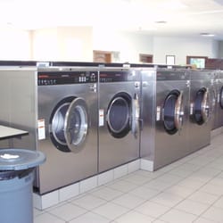 Village Laundromat - These are our large machines that hold 6 baskets and 8 baskets per load. For best results do not fill the machines more than 3/4