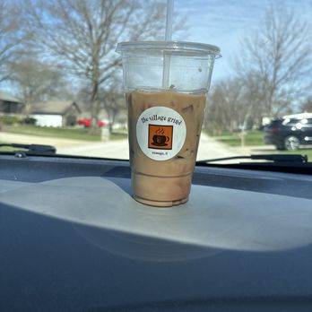 The Village Grind - pic: a 20oz mocha that tastes like water and a splash of coffee. ill have to add espresso to this to make it decent. will not be coming back - Coffee & Tea Near Me - Oswego, Illinois