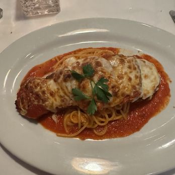 Lugano Ristorante - Eggplant Parm over spaghetti. - Italian Near Me - Cary, North Carolina Lugano Ristorante - Eggplant Parm over spaghetti. - Italian Near Me - Cary, North Carolina