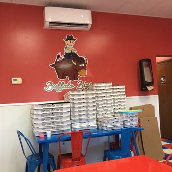 Little Bigs - a table with stacks of pizza on it - Pizza Near Me - Fort Ashby, West Virginia Little Bigs - a table with stacks of pizza on it - Pizza Near Me - Fort Ashby, West Virginia