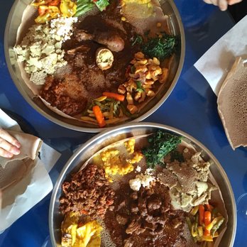 Cafe Ibex - Partially eaten chicken (top) and beef combos - both very good - Ethiopian Near Me - Seattle, Washington Cafe Ibex - Partially eaten chicken (top) and beef combos - both very good - Ethiopian Near Me - Seattle, Washington
