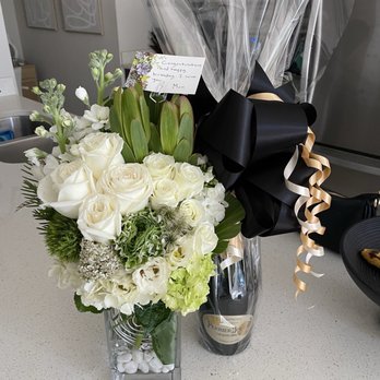 Tamara's Flower Garden - Congratulations bouquet and champagne delivery for my daughter moving into a new home! - Florists Near Me - Delray Beach, Florida