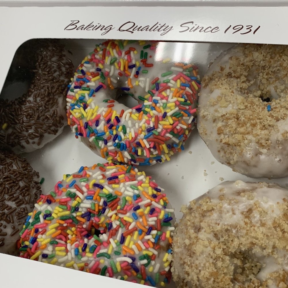 a dozen donuts in a box a dozen donuts in a box