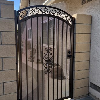 MCS Iron Works - Single Gate with an arched on top and privacy screen ( deadbolt and Doorknob ) - Metal Fabricators Near Me - Rancho Cucamonga, California MCS Iron Works - Single Gate with an arched on top and privacy screen ( deadbolt and Doorknob ) - Metal Fabricators Near Me - Rancho Cucamonga, California
