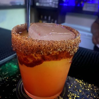 Sugar T's Bar & Lounge - a drink with a straw - Bars Near Me - Houston, Texas Sugar T's Bar & Lounge - a drink with a straw - Bars Near Me - Houston, Texas