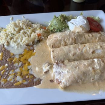 Los Pinos Mexican Restaurant - 3 Shrimp (grilled) Enchilatas with yummy sauce and the Lime Cilantro Rice is da bomb!! Price is not bad either ..$18 - Mexican Near Me - Livingston, Montana Los Pinos Mexican Restaurant - 3 Shrimp (grilled) Enchilatas with yummy sauce and the Lime Cilantro Rice is da bomb!! Price is not bad either ..$18 - Mexican Near Me - Livingston, Montana