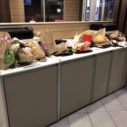 a counter with bags of food on it