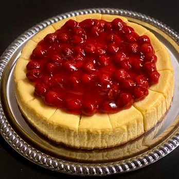 Just Rennie's Cafe & Cookie - cheesecake topped with cherries - Desserts Near Me - Evansville, Indiana Just Rennie's Cafe & Cookie - cheesecake topped with cherries - Desserts Near Me - Evansville, Indiana