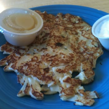 The Old European Restaurant - German Potato Pancake with applesauce and sour cream mix them together for a rich flavor. - Breakfast & Brunch Near Me - Post Falls, Idaho The Old European Restaurant - German Potato Pancake with applesauce and sour cream mix them together for a rich flavor. - Breakfast & Brunch Near Me - Post Falls, Idaho