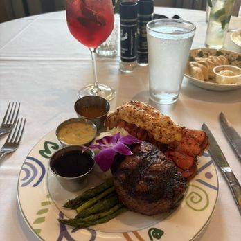 Rosemary and Thyme - Medium rare 8 oz Filet mignon, cold water lobster tail, mashed potatoes, asparagus - American Near Me - Sarasota, Florida Rosemary and Thyme - Medium rare 8 oz Filet mignon, cold water lobster tail, mashed potatoes, asparagus - American Near Me - Sarasota, Florida