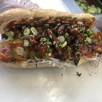 That Won Truck - Bulgogi Beef Bahn Mi. Gojuchuang sauce, sesame and green onions. It'll hit you in the feels. - Food Trucks Near Me That Won Truck - Bulgogi Beef Bahn Mi. Gojuchuang sauce, sesame and green onions. It'll hit you in the feels. - Food Trucks Near Me