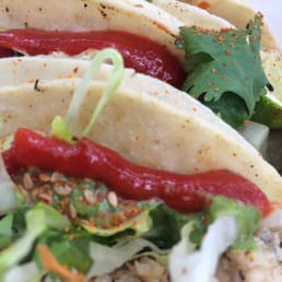 Grilled fish tacos with sriracha sauce. Not much seasoning on the fish itself, but not bad overall. Grilled fish tacos with sriracha sauce. Not much seasoning on the fish itself, but not bad overall.