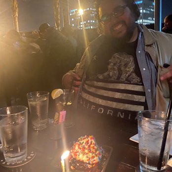 Bosscat Kitchen & Libations - Birthday brownie and bday boy! - New American Near Me - Irvine, California Bosscat Kitchen & Libations - Birthday brownie and bday boy! - New American Near Me - Irvine, California