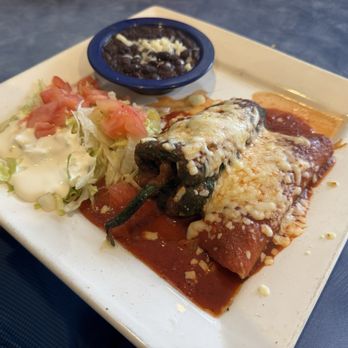Tony's Cantina Mexican Grill - Chicken Stuffed poblano pepper with enchilada, basic beans and salad (build your own combo) - Mexican Near Me - Jacksonville, Florida Tony's Cantina Mexican Grill - Chicken Stuffed poblano pepper with enchilada, basic beans and salad (build your own combo) - Mexican Near Me - Jacksonville, Florida
