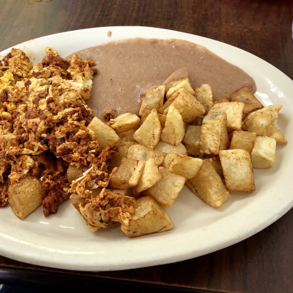 El Jalisco - 'Chorizo con huevo' served with potatoes and beans - Mexican Near Me - San Antonio, Texas