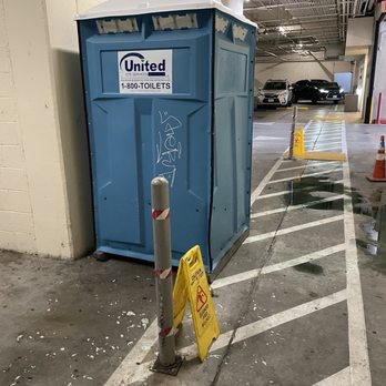 Avalon Encino - Porta potty with urine and chemicals leaking. - Apartments Near Me - Encino, California