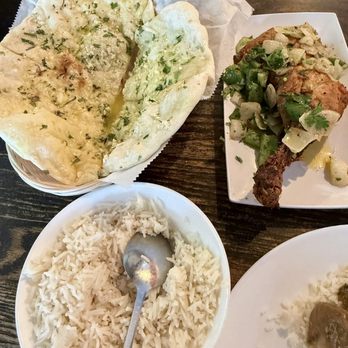 Indian Bistro - Tandoori chicken Goat with bone in Garlic naans - Indian Near Me - Clearwater, Florida Indian Bistro - Tandoori chicken Goat with bone in Garlic naans - Indian Near Me - Clearwater, Florida