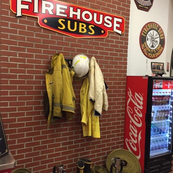 Firehouse Subs - a fireman's uniform and fire hoses - Sandwiches Near Me - Riverdale, Utah