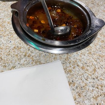 Buffalo Little Lamb - a bowl of stew with a spoon in it - Hot Pot Near Me - Amherst, New York Buffalo Little Lamb - a bowl of stew with a spoon in it - Hot Pot Near Me - Amherst, New York