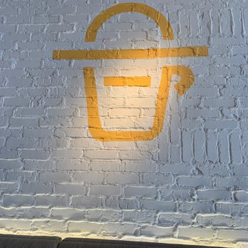 Cupitol Coffee & Eatery - Cute logo on wall - Coffee & Tea Near Me - Chicago, Illinois