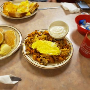Billy's Cafe - CFS potato platter with one scrambled egg, gravy with pancakes. In the back, Mega Billy Omelette with hash browns add cheese and toast. - Breakfast & Brunch Near Me - Omaha, Nebraska Billy's Cafe - CFS potato platter with one scrambled egg, gravy with pancakes. In the back, Mega Billy Omelette with hash browns add cheese and toast. - Breakfast & Brunch Near Me - Omaha, Nebraska