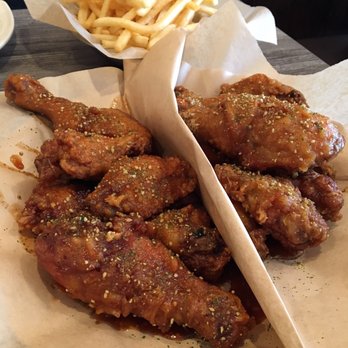The Chicken On Fire - Medium spicy and soy garlic with fries in the back - Chicken Wings Near Me - Castro Valley, California The Chicken On Fire - Medium spicy and soy garlic with fries in the back - Chicken Wings Near Me - Castro Valley, California